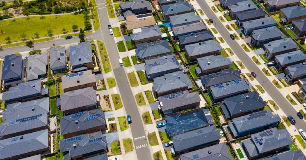 The Impact of Dark Coloured Roofs on Urban Heat Islands